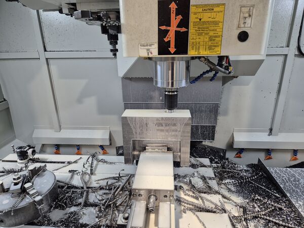 CNC milling of a machine part on the machining centre — MIKRO-PRO.