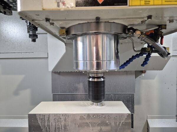 CNC milling of a machine part on the machining centre — MIKRO-PRO.