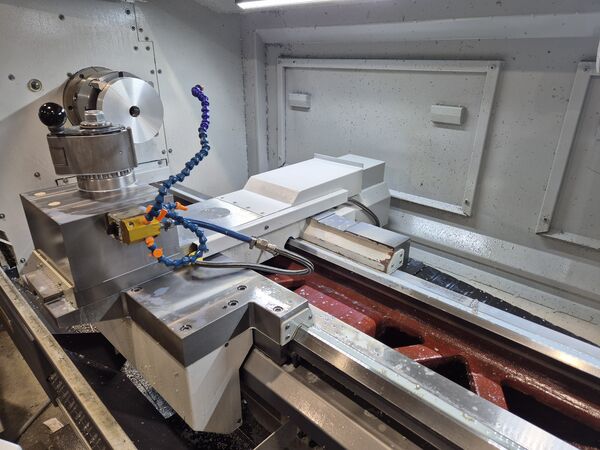 Turning a metal part on a CNC lathe — MIKRO-PRO workshop, Ruše.