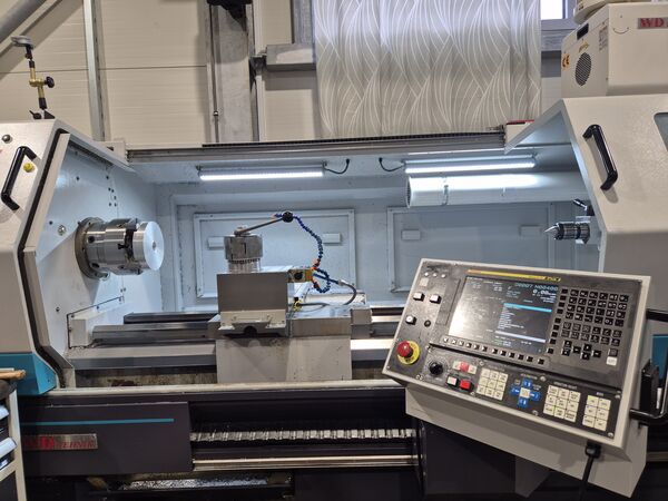 Turning a metal part on a CNC lathe — MIKRO-PRO workshop, Ruše.